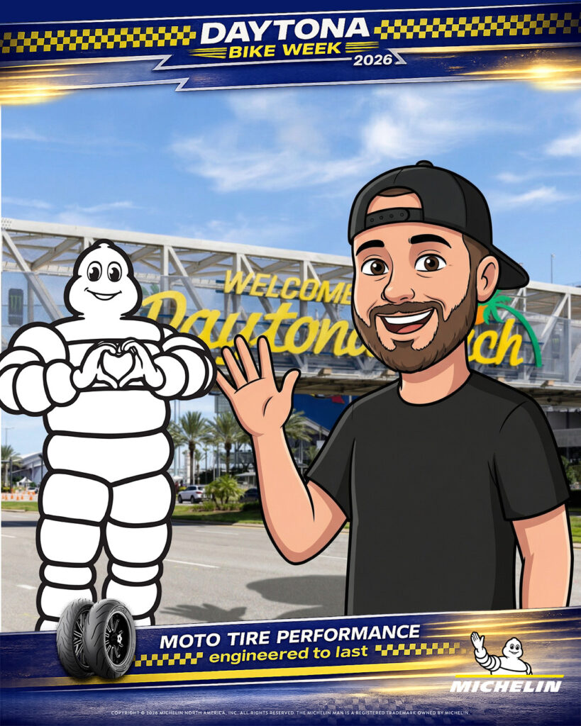 Cartoon man waves beside the Michelin Man at a Welcome to Daytona Beach sign, featuring Daytona Bike Week 2026 and Michelin tire branding—perfect for an experiential marketing photo booth.