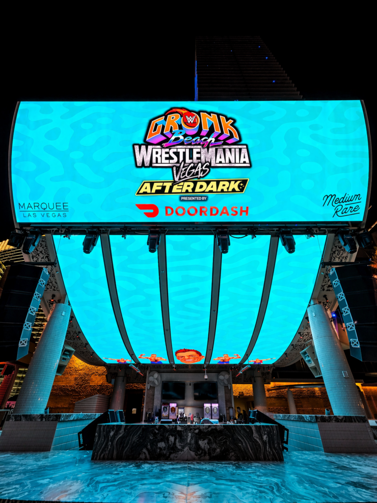 A large digital screen at an outdoor venue showcases logos for major brands and events—perfect inspiration for experiential marketing Las Vegas events and concert activation ideas.